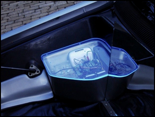 Controller for a custom automotive hood mounted projection screen.